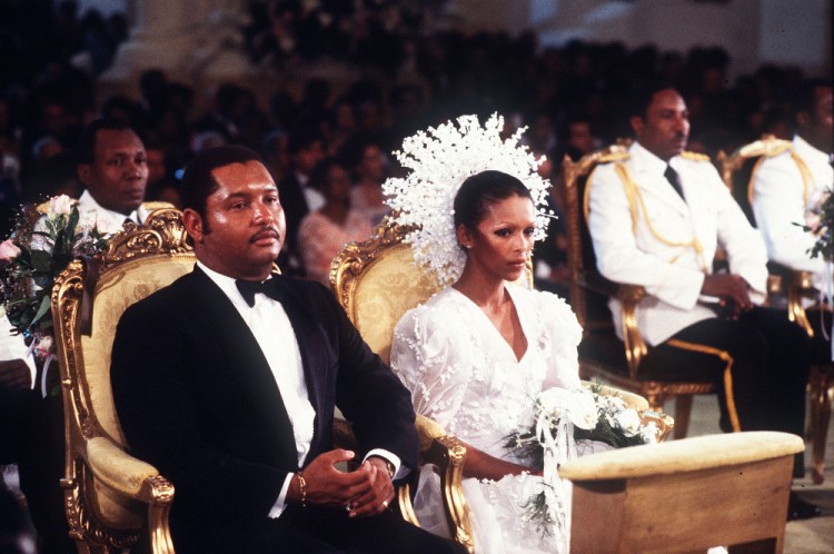 Then-Haitian president Jean-Claude Duvalier is pictured with his bride,  Michele Bennett, during their wedding ceremony in 1980.