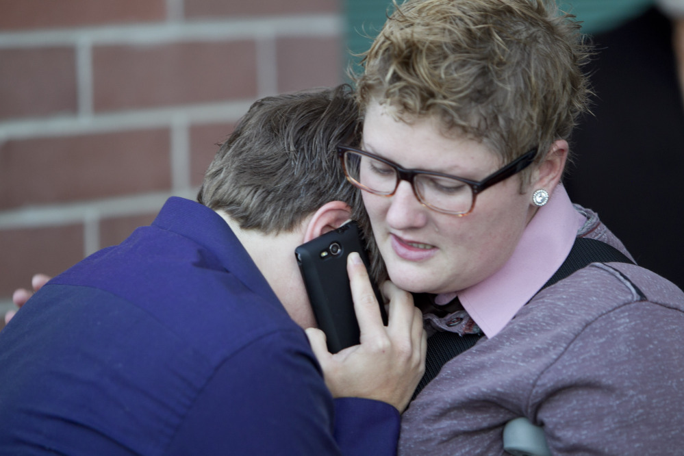 Rachael Beierle, right, consoles partner Amber Beierle after they were denied the opportunity for a marriage license inside the Ada County Courthouse on Wednesday in Boise, Idaho.