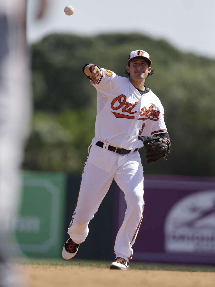 The Orioles’ Ryan Flaherty excelled in baseball as a youngster with an assist from his father, Ed, the longtime baseball coach at the University of Southern Maine. Ryan Flaherty was the 11-year-old batboy when the Huskies won the NCAA Division III championship in 1977.