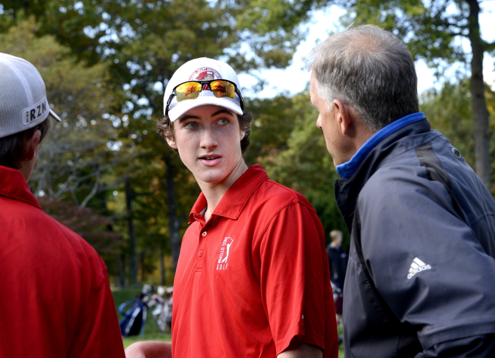Mike Murphy, right, with Braeden Kane, hasn’t won a team state title in his 26 seasons as the Scarborough High golf coach. But he has a good chance Saturday with a talent-laden group that’s met every challenge this season.