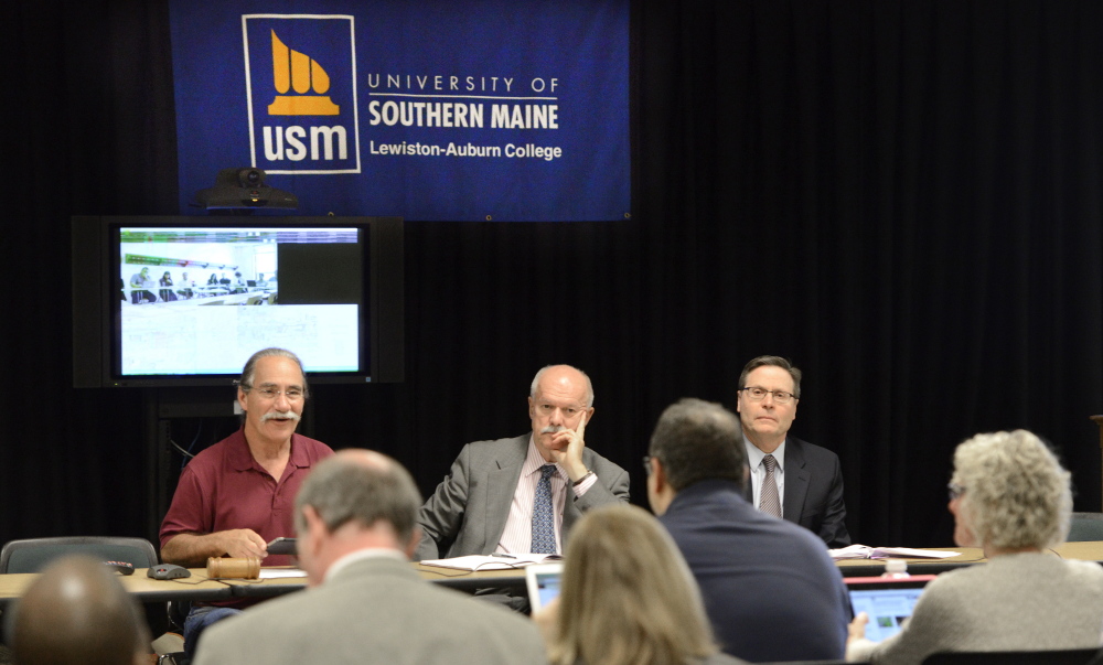 USM Faculty Senate Chairman Jerry LaSala, left, speaks as the university’s President David Flanagan, center, and Provost Joe McDonnell listen during a Faculty Senate meeting in Lewiston on Friday. Proposals to shut a campus and improve retirement incentives were discussed.