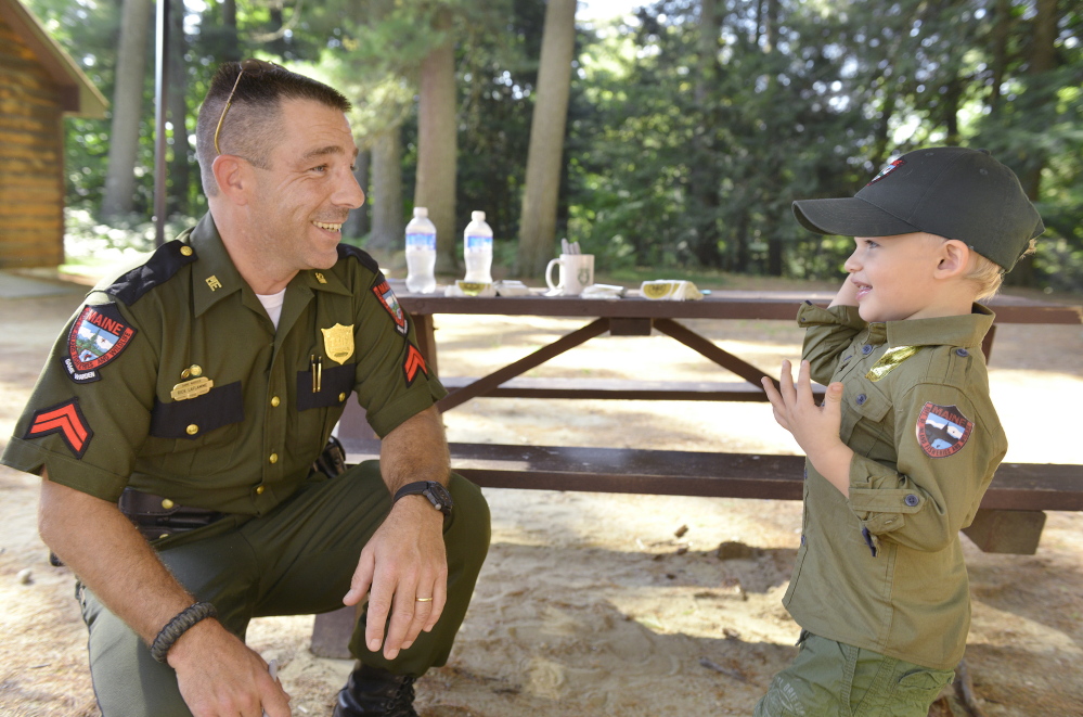 Three-year-old Christopher Armstrong wears his own warden’s uniform, lovingly stitched by his mom – a fan of the popular TV show. He also got a chance to meet a role model, Warden Rick LaFlamme.