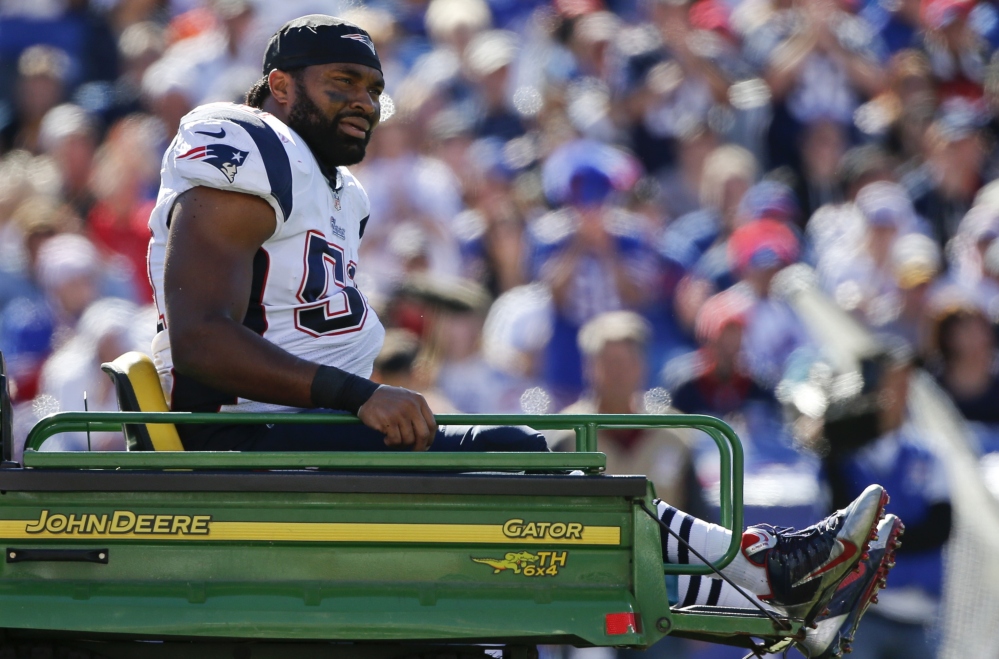 New England Patriots middle linebacker Jerod Mayo (51) is carted off the field after being injured on a play in the first half against the Buffalo Bills on Sunday in Orchard Park, N.Y. The Associated Press