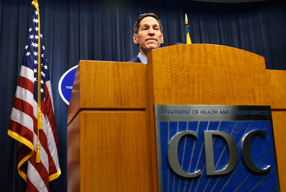 The Associated Press Centers for Disease Control Director Tom Frieden provides an update on the latest developments involving the deadly Ebola virus and its infection of a Texas health care professional as he addresses the media at CDC headquarters Monday. Frieden said the CDC is working to improve protection for hospital workers after a nurse caring for an Ebola patient in Dallas became the first person to become infected with the disease inside the U.S.