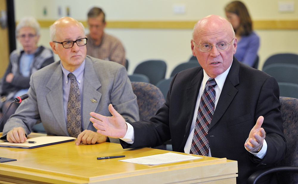 Jay Harper, left, acting superintendent at Riverview, and Daniel Wathen, court master, respond to questions at a hearing before the Health and Human Services Committee in Augusta on Wednesday.