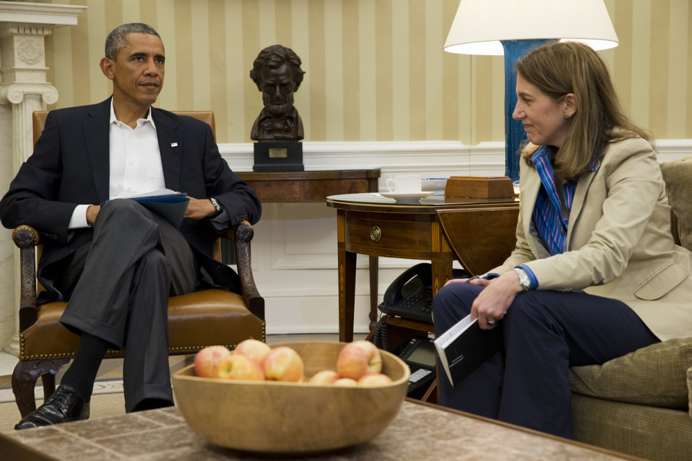 President Barack Obama meets with Health and Human Services Secretary Sylvia Burwell on Monday at a gathering of his public health and national security team to address the response to Ebola cases in Dallas, Texas. He will meet with his Cabinet about the topic on Wednesday.