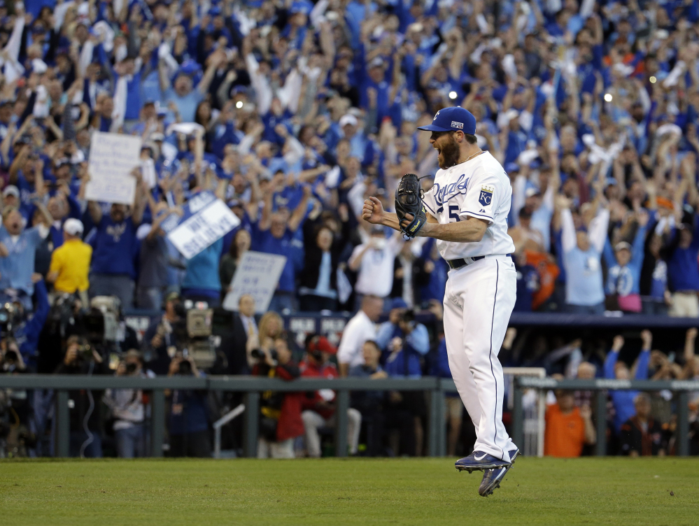 Kansas City Royals relief pitcher Greg Holland celebrates after closing a 2-1 win against the Baltimore Orioles in Game 4 of the American League Championship Series on Wednesday in Kansas City. The Royals advance to World Series for the first time since 1985.