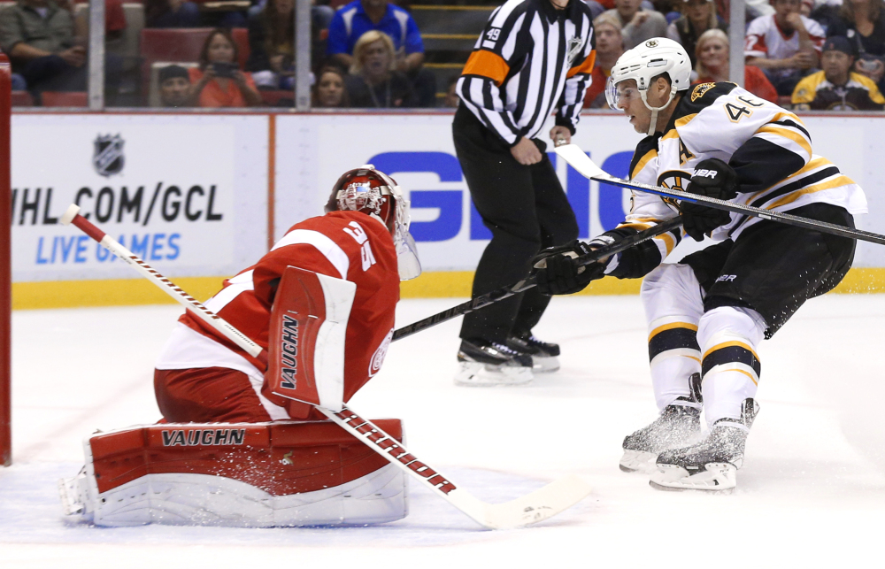 Boston Bruins center David Krejci scores against Detroit Red Wings goalie Jimmy Howard in the first period of Wednesday night’s game in Detroit.
