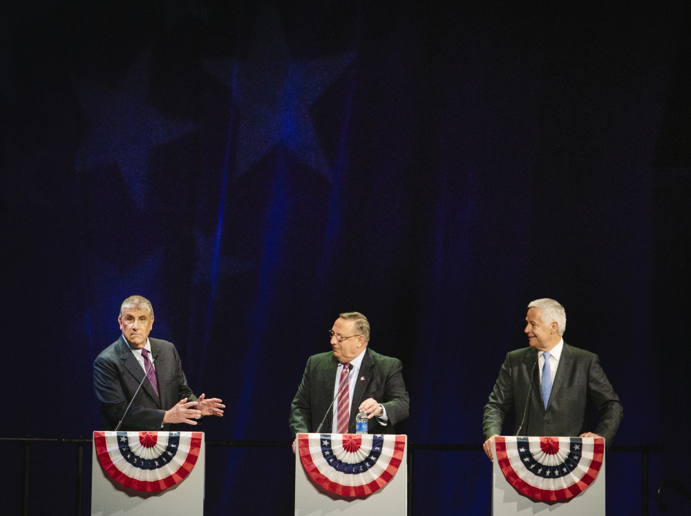 AUGUSTA, ME - OCTOBER 15: Independent candidate Eliot Cutler  responds to current governor and Republican candidate Paul LePage during the Maine State Chamber's Gubernatorial Forum at the Augusta Civic Center in Augusta, ME on Wednesday, October 15, 2014. "You say that you've created 20 to 22,000 jobs, and you're proud of that. That's like saying the Red Sox had a good year because they won 71 games," Cutler said. (Photo by Whitney Hayward/Staff Photographer)