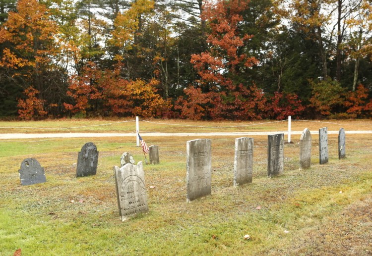 Most of the headstones believed to have been relocated from a small cemetery decades ago now stand in Riverside Cemetery in Cornish. Some of them may be linked to eight sets of remains found behind City Hall.