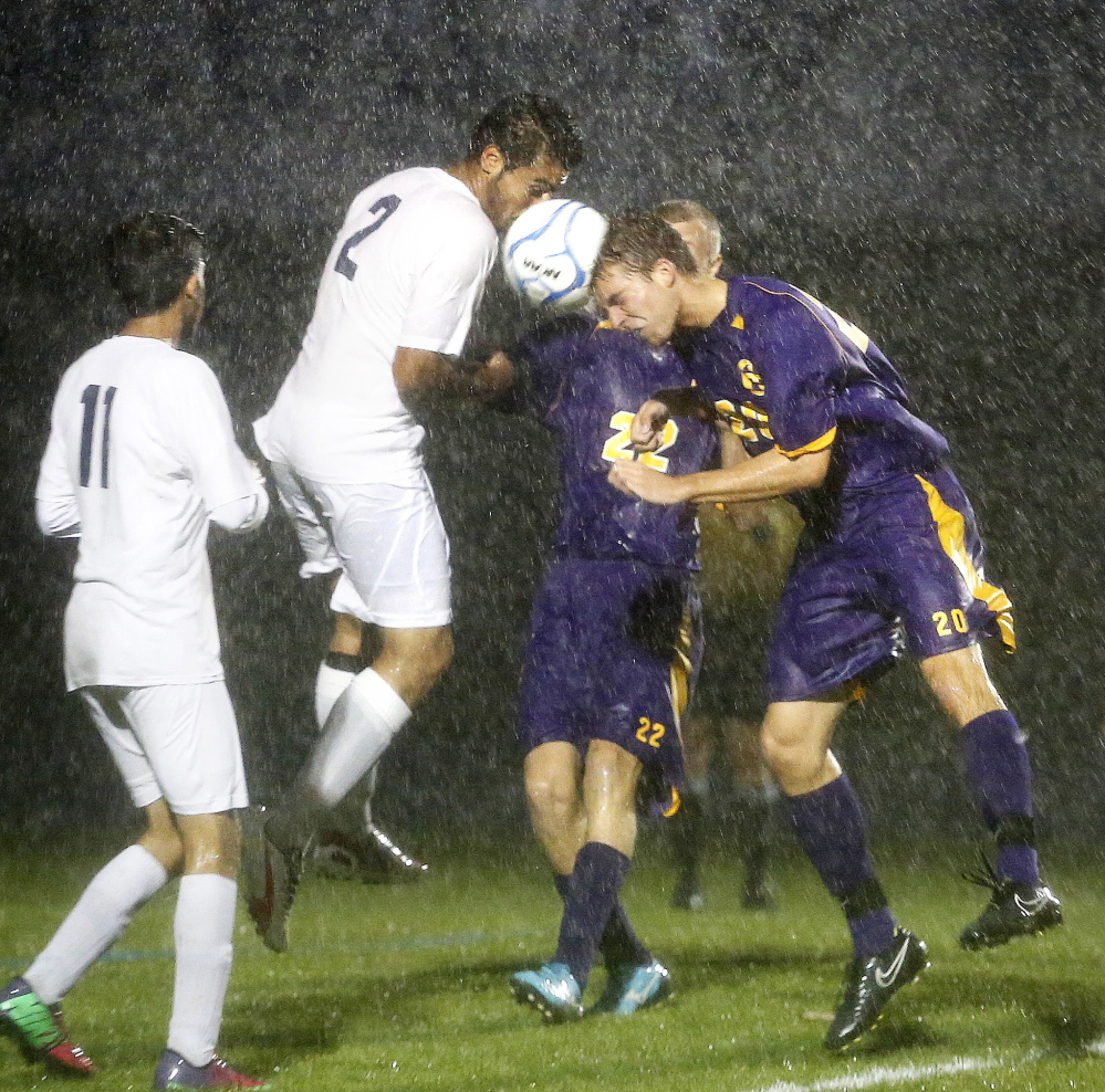 And the winner was … rain. The Cheverus-Westbrook game was called after 17 minutes Thursday night, after Alex Nason of Cheverus got his head on the ball. Noor Abdulabas, left, and Mohammed Alkinani of Westbrook defend.
