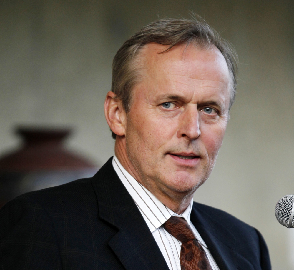 John Grisham speaks in 2011. He apologized Thursday for comments he made that seem to excuse child abusers.