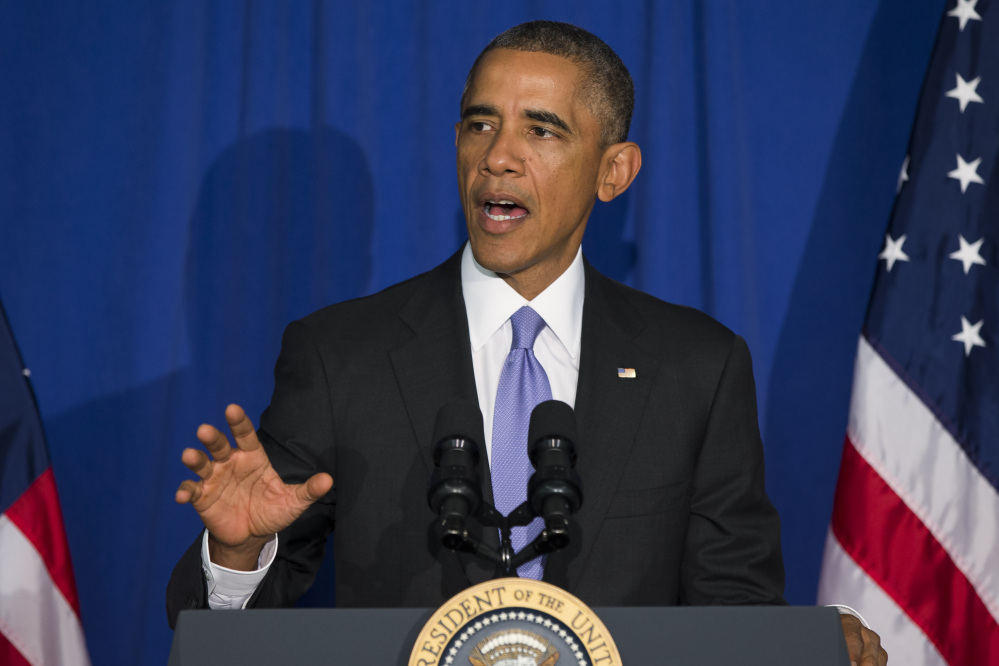 President Barack Obama delivers remarks at the Consumer Financial Protection Bureau, on Friday, in Washington.