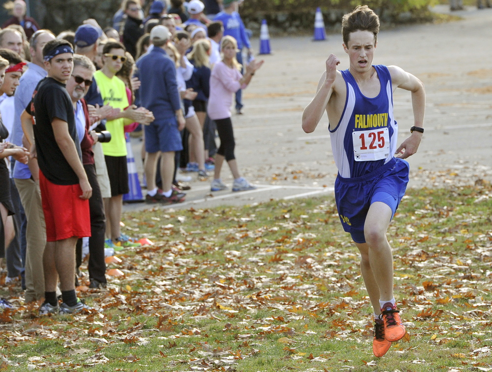 Bryce Murdick of Falmouth heads to the finish, alone in front and finishing the 3.1-mile course in 16 minutes, 49 seconds. Mitchell Morris of Cape Elizabeth was second in 16:59.