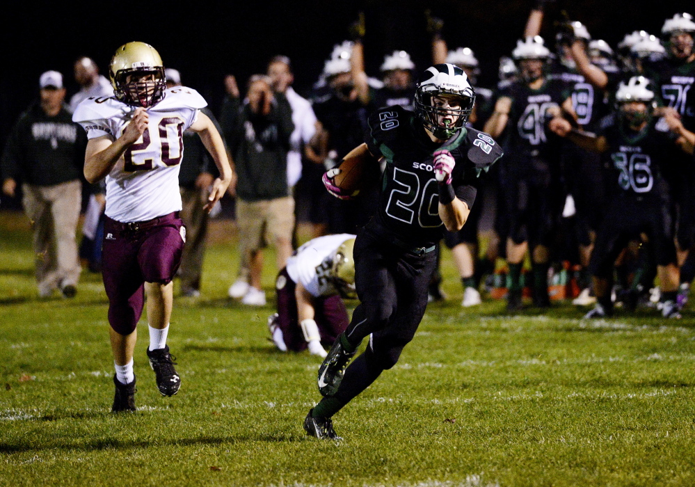 Bonny Eagle’s Ben Malloy breaks away from Matthew Cleary of Thornton Academy on his way to a 45-yard touchdown reception in the first quarter Friday.