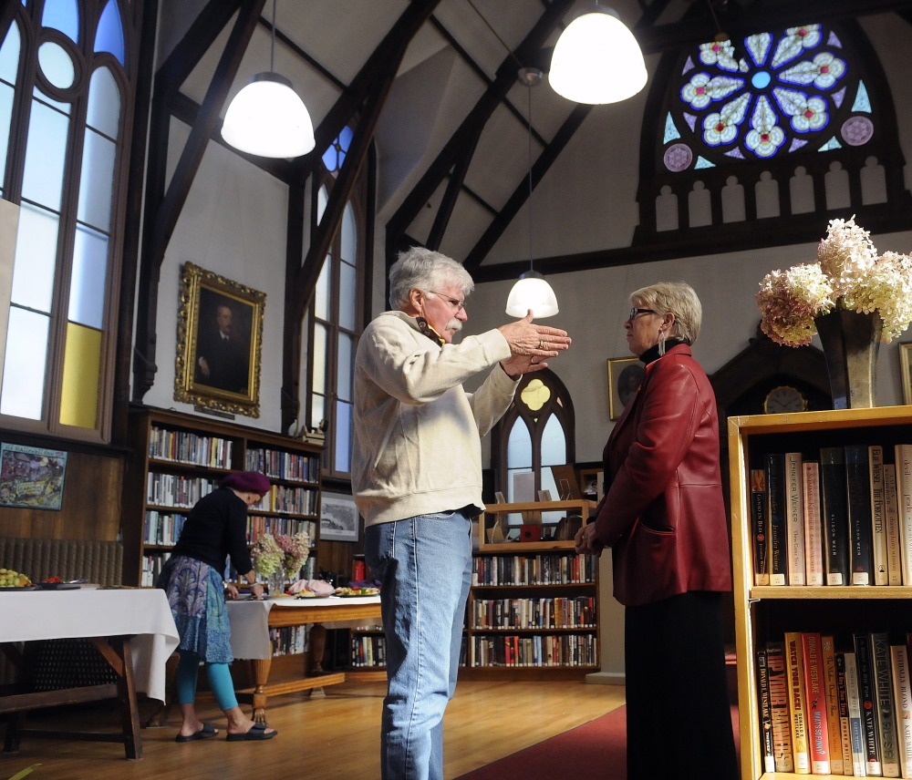 Guests visit the Hubbard Free Library Sunday as the Hallowell institution celebrated achieving its fundraising goal for the first phase of a capital campaign.
