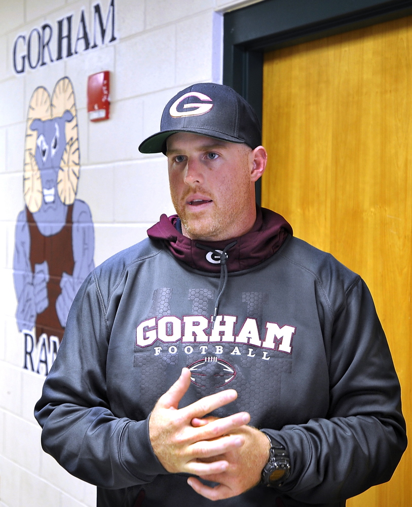 Gorham High School football coach Andy Hager discusses the death of lineman Branden Denis in a car accident Sunday. “Everything he did was for the team,” one teammate said.
