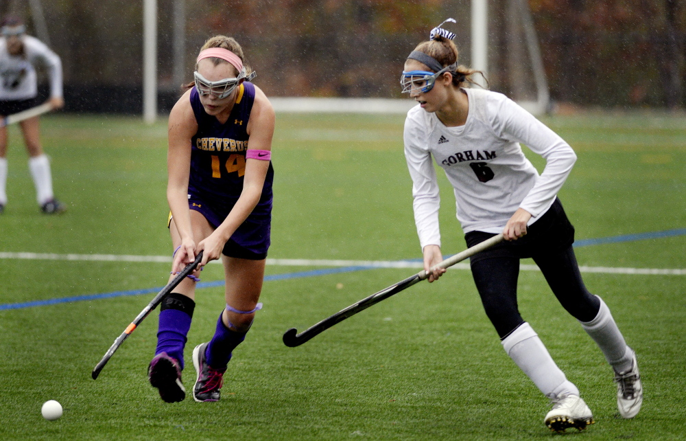 GORHAM, ME - OCTOBER 21: Hannah Abbott of Cheverus and Delaney Shiers of Gorham chase down  the ball field hockey action Tuesday, October 21, 2014. (Photo by Shawn Patrick Ouellette/Staff Photographer)