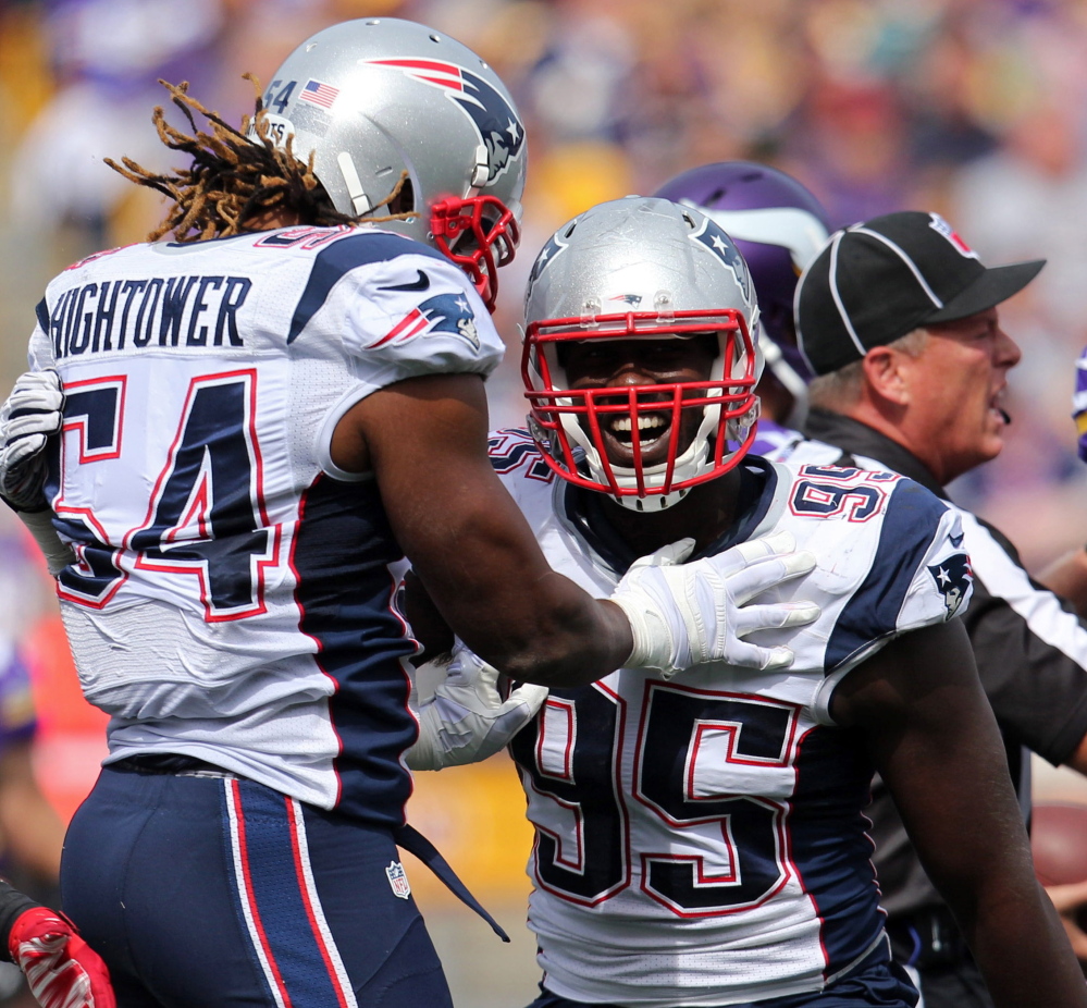 Chandler Jones, right, celebrating with Donta Hightower, may miss as much as a month for the Patriots with a hip injury, and that may impact the pass rushing game.