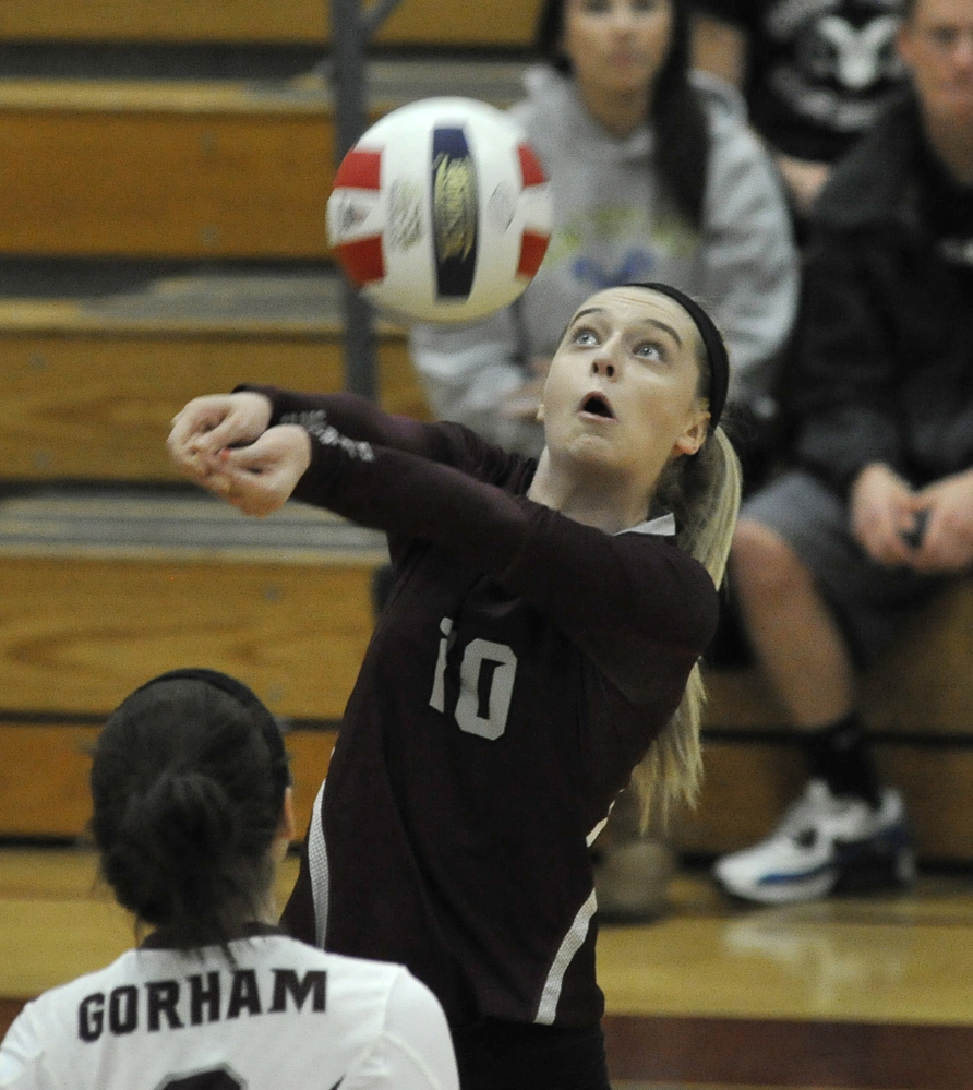 Ciara Stillson of Gorham keeps her concentration on the ball and returns it against Windham. Gorham lost the first set, then recovered to capture the next three.