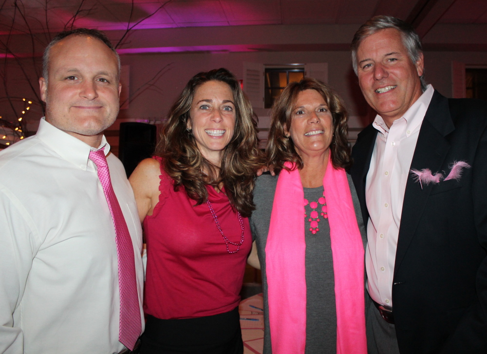 Dana Kerr, left, and his wife Francesca, a Witches Wear Pink committee member, with Cheryl and Don Olen of Falmouth.