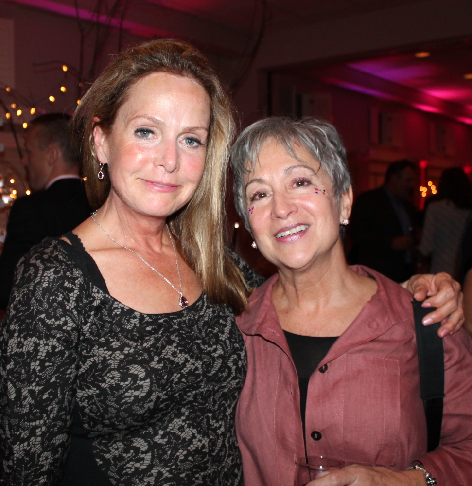 Gail Waitkun, left, of Portland with her friend Cynthia Carrier-Burnett of Falmouth, a cancer survivor.