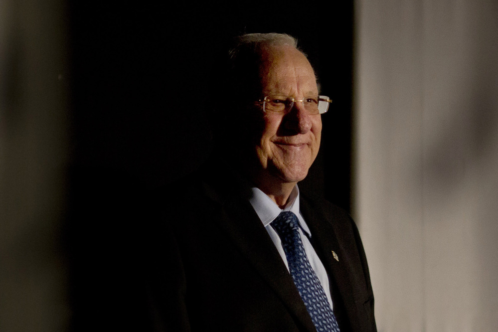Israel’s President Reuven Rivlin arrives to the annual memorial ceremony for the 47 Arab-Israelis killed by Israeli border policemen on October 29, 1956 in the Arab-Israeli town of  Kfar Kassem, central Israel, on Sunday. Rivlin has visited the site of a 1956 massacre as part of an outreach campaign to the country’s Arab minority.