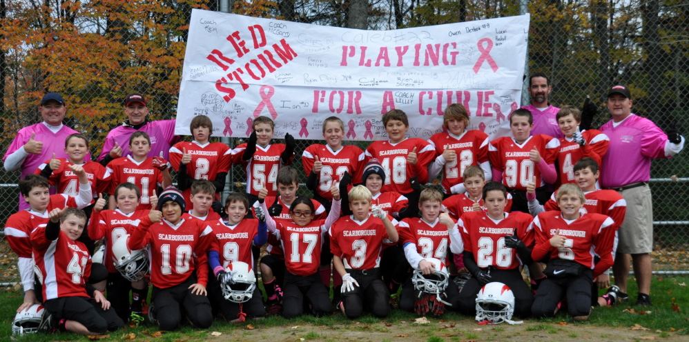 Members of the Scarborough youth football team, The Red Storm, recently wore pink wristbands, ribbons and custom-made pink football socks to show their support for breast cancer awareness.