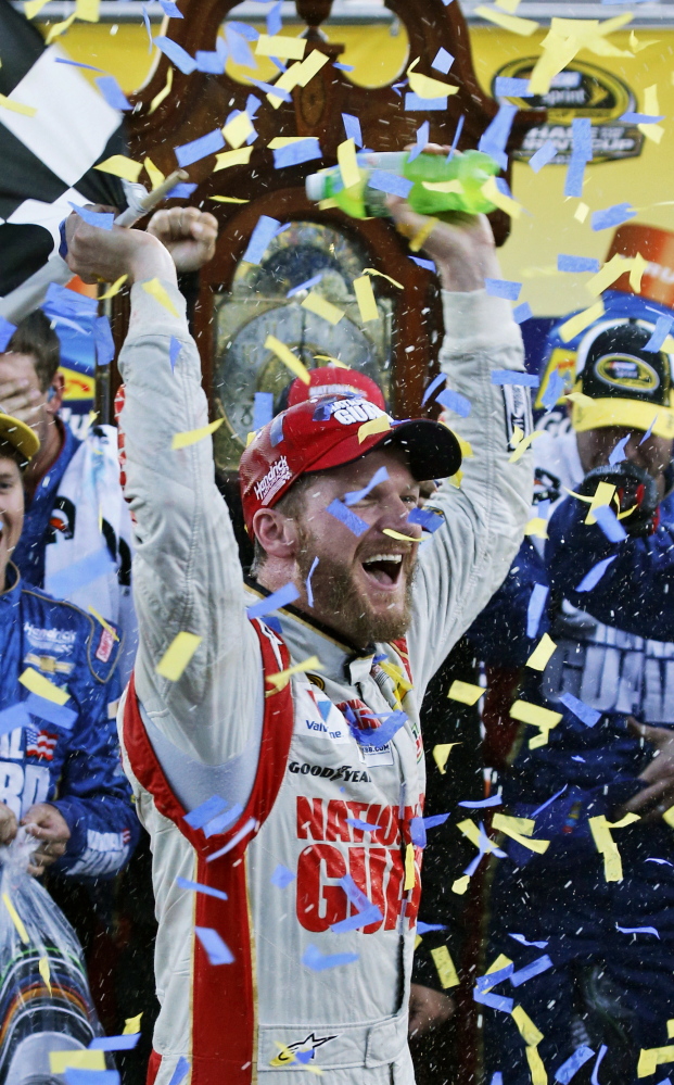 Earnhardt Jr. beat teammate Jeff Gordon, giving Hendrick Motorsports a 1-2 finish on the 10-year anniversary of a plane crash that killed 10 people on their way to the speedway.