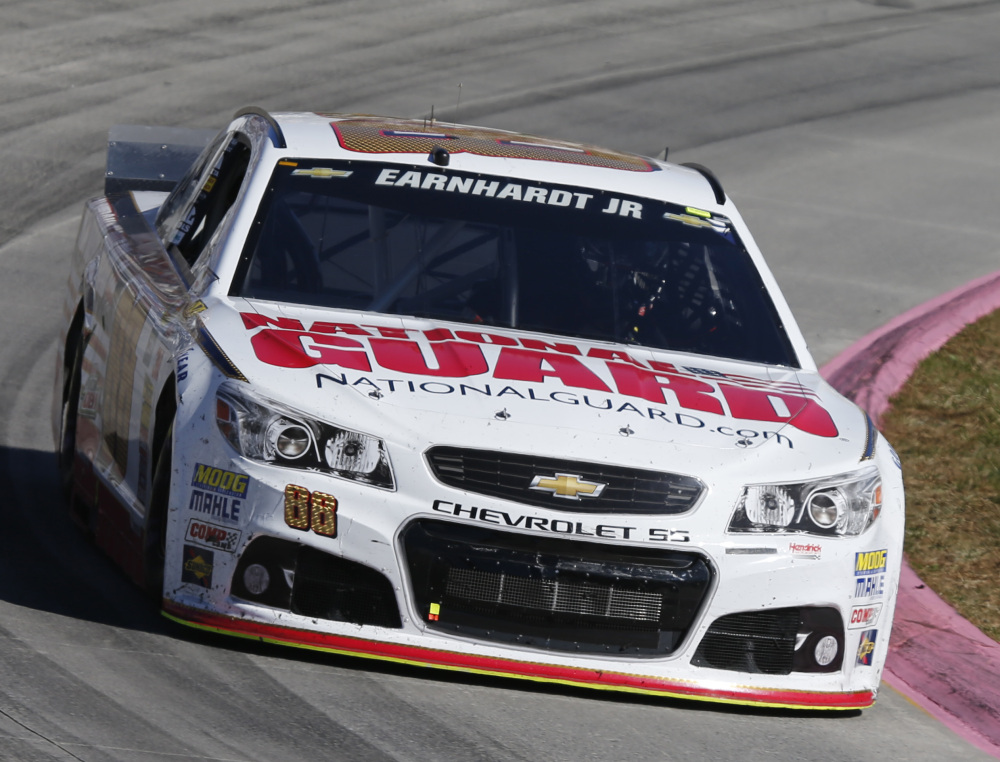Dale Earnhardt Jr. missed his chance to advance in the Chase for the Sprint Cup championship last week, but earned an emotional victory Sunday at Martinsville Speedway in Martinsville, Va.