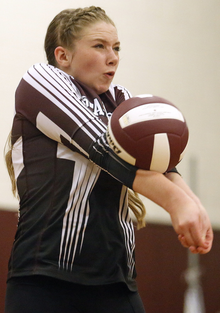 Greely’s Lauren Wickert sets the ball during the Rangers’ 3-2 loss to Cape Elizabeth in the Class A semifinals Wednesday night in Cumberland. Cape stunned the top-seeded Rangers by winning the final three sets.