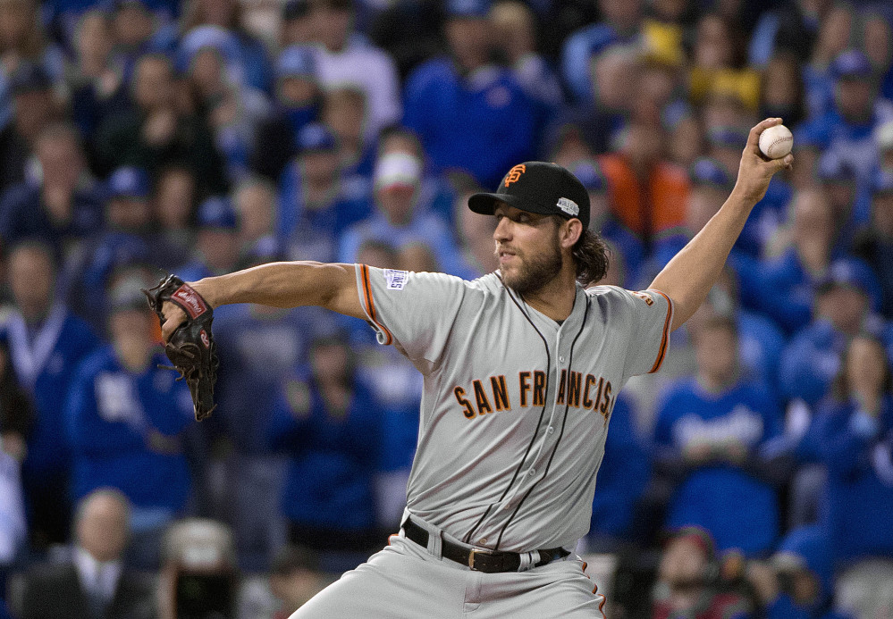 Madison Bumgarner pitches in the bottom of the fifth inning Wednesday night in Kansas City. Bumgarner pitched five innings of near-perfect relief.