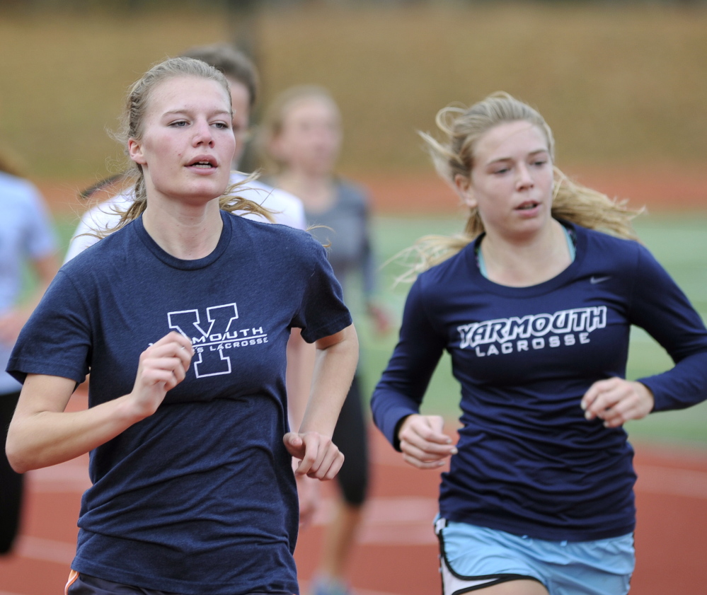 Caitlin Teare, left, and Sarah Myers, both seniors, will be aided by three strong underclassmen Saturday as the Clippers attempt to break through a talented field and win the Class B cross country championship.