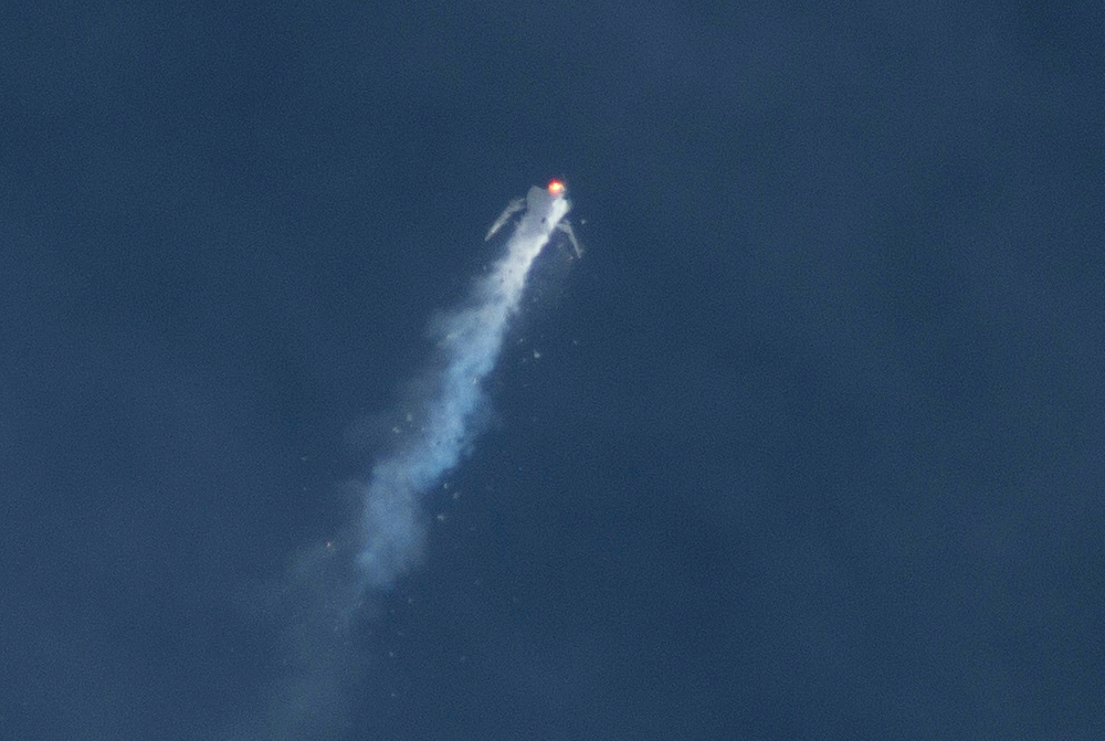 The Virgin Galactic SpaceShipTwo rocket explodes in the air during a test flight on Friday over Southern California’s Mojave Desert.