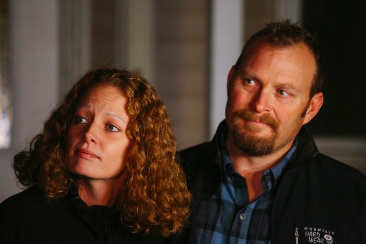 Kaci Hickox and boyfriend, Ted Wilbur, take questions about Maine's quarantine policy outside Wilbur's home in Fort Kent on Wednesday. "I remain in good spirits and I'm thankful to be home with my partner Ted," she said. "I went into public health because I believe that good science and compassion can make a difference in peoples' lives. That is exactly why I went to Sierra leone to fight Ebola. It is not my intention to put anyone at risk in this community." 