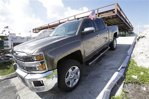 A 2015 Chevrolet Silverado 2500 4WD LTZ Crew Cab pickup truck is on display at a dealership in Miami Lakes, Fla. "The new trucks and SUVs are more profitable than the ones they replaced," says GM Chief Financial Officer Chuck Stevens. The Associated Press