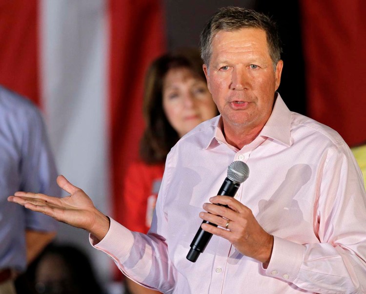 Ohio Gov. John Kasich speaks at a GOP Get Out the Vote rally in Independence, Ohio, recently. Kasich doesn't think the Affordable Care Act will be repealed. "That's not gonna happen," he says.  The Associated Press 