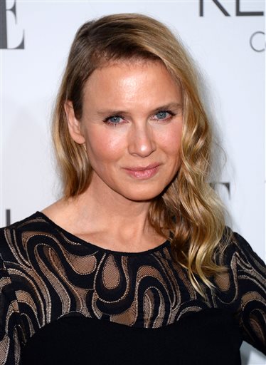 Renee Zellweger says she’s glad folks think she looks different today, above, than she did in 2010, below. The Associated Press