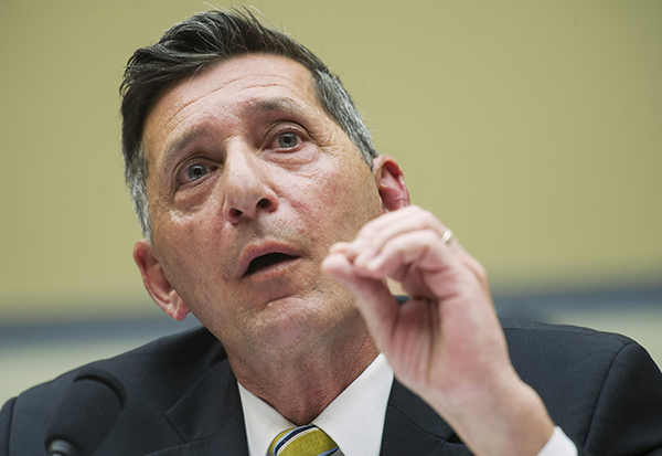 Michael Botticelli, acting director of the Office of National Drug Control Policy, testifies on Capitol Hill in this Feb. 4, 2014, photo. Botticelli has been  promoting a shift to a treatment-driven response to drug abuse by telling his own story about addiction. He has been sober for a quarter of a century. 