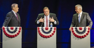 Current governor and Republican candidate Paul LePage responds to questions on Medicaid expansion during the Maine State Chamber’s gubernatorial forum at the Augusta Civic Center on Oct. 15. 2014 File Photo/Whitney Hayward