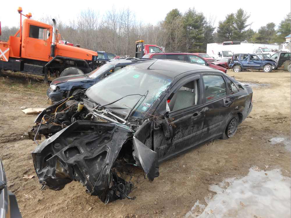 A West Gardiner teen apparently lost control of the car he was driving, breaking off a utility pole at the ground and rolling the car over several times. The impact tore the engine from the car. Photo courtesy of the Maine Department of Public Safety