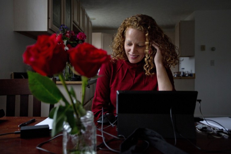 Kaci Hickox speaks on the phone with a state health official Saturday to report that she has no symptoms of Ebola. Hickox hopes other health workers treating Ebola patients will be treated better than she has been. “I know that won’t happen today,” she said.