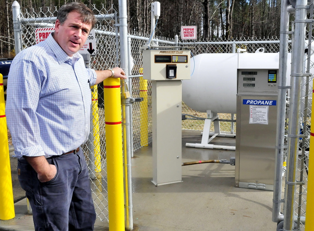 Robert Shibley, owner of Bob’s Cash Fuel business in Madison, speaks about offering propane fuel for vehicles beside pumps and meters for the product on Thursday, Oct. 30, 2014.