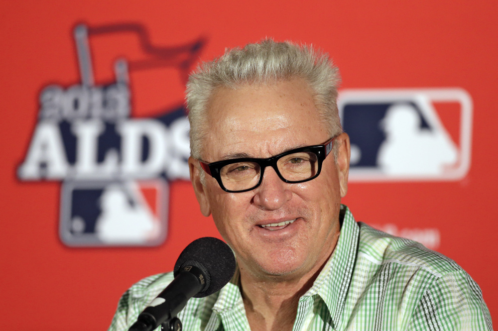 In this Oct. 6, 2013, file photo, Tampa Bay Rays manager Joe Maddon smiles during a news conference before Game 3 of baseball’s American League division series against the Boston Red Sox in St. Petersburg, Fla. )