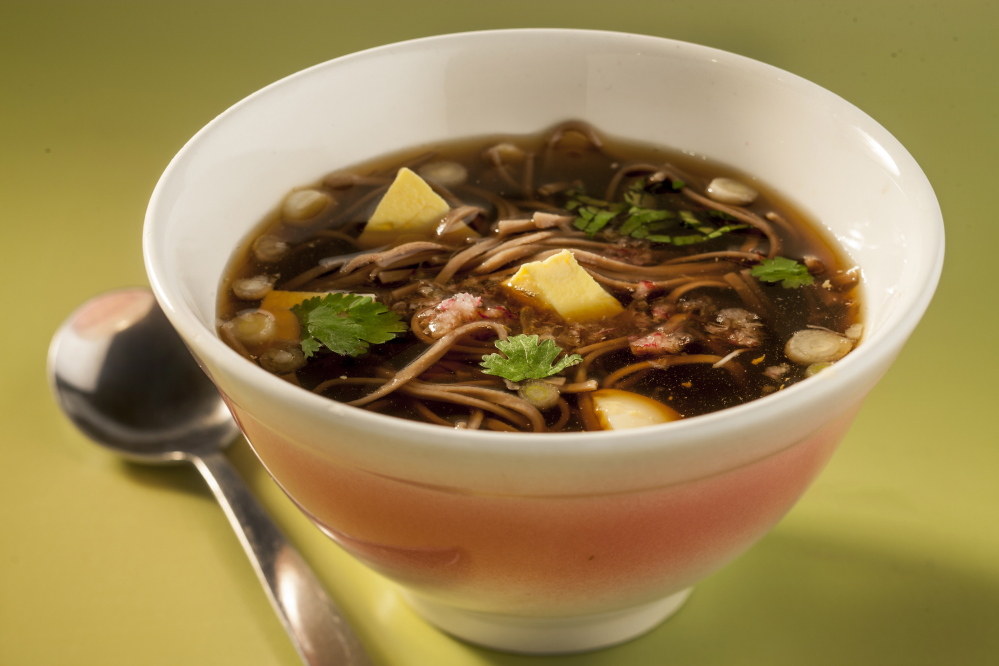 Tsuyu is a simple soup of dashi, mirin and soy sauce. Pour over cold soba noodles and serve as is or garnished with cilantro, sliced green onion, cubed tofu, hard cooked egg or grated radish.