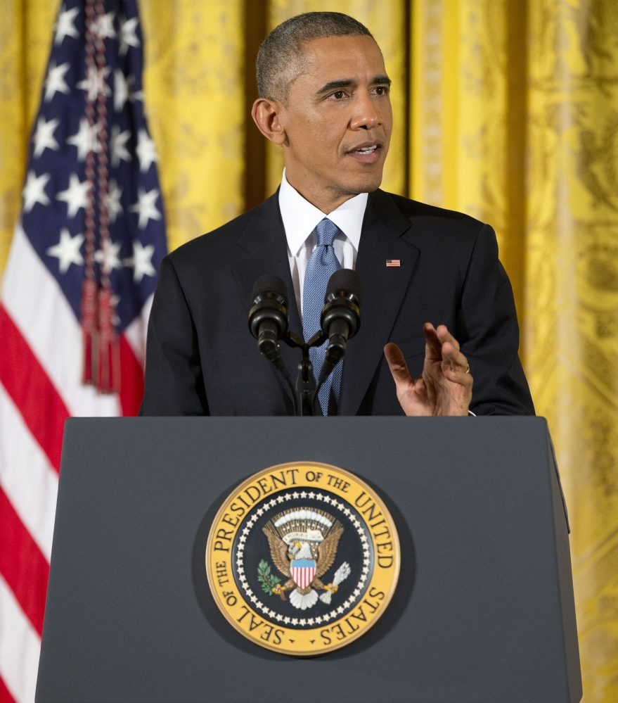 President Barack Obama speaks during a news conference in the East Room of the White House on Wednesday in Washington.