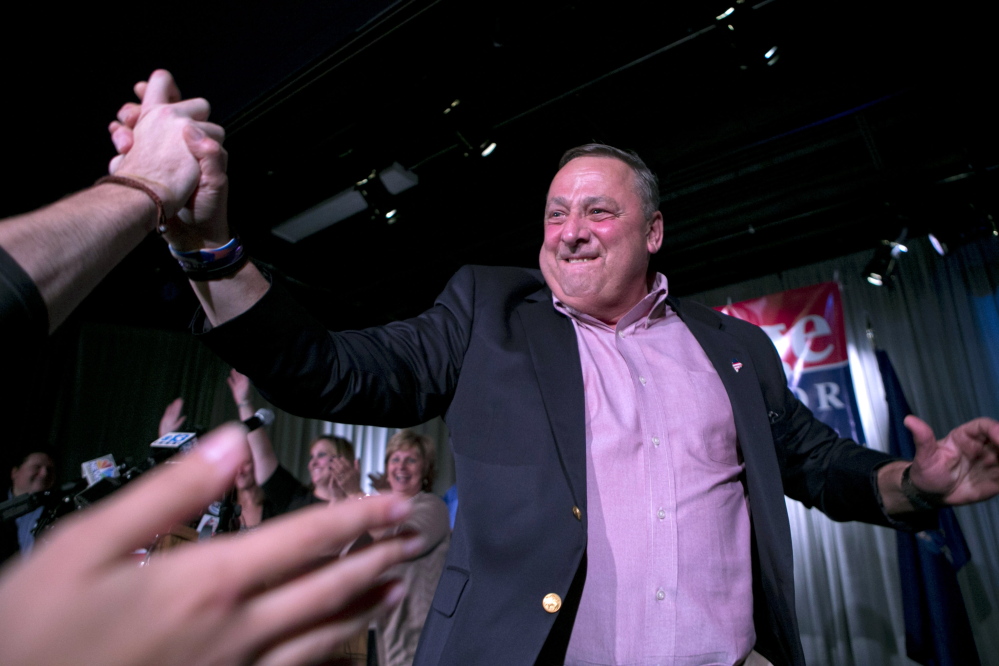 Gov. Paul LePage celebrates the success of his re-election bid at his election night party Tuesday. Once again, he and his Republican colleagues have been given another chance to move his economic ideas forward.