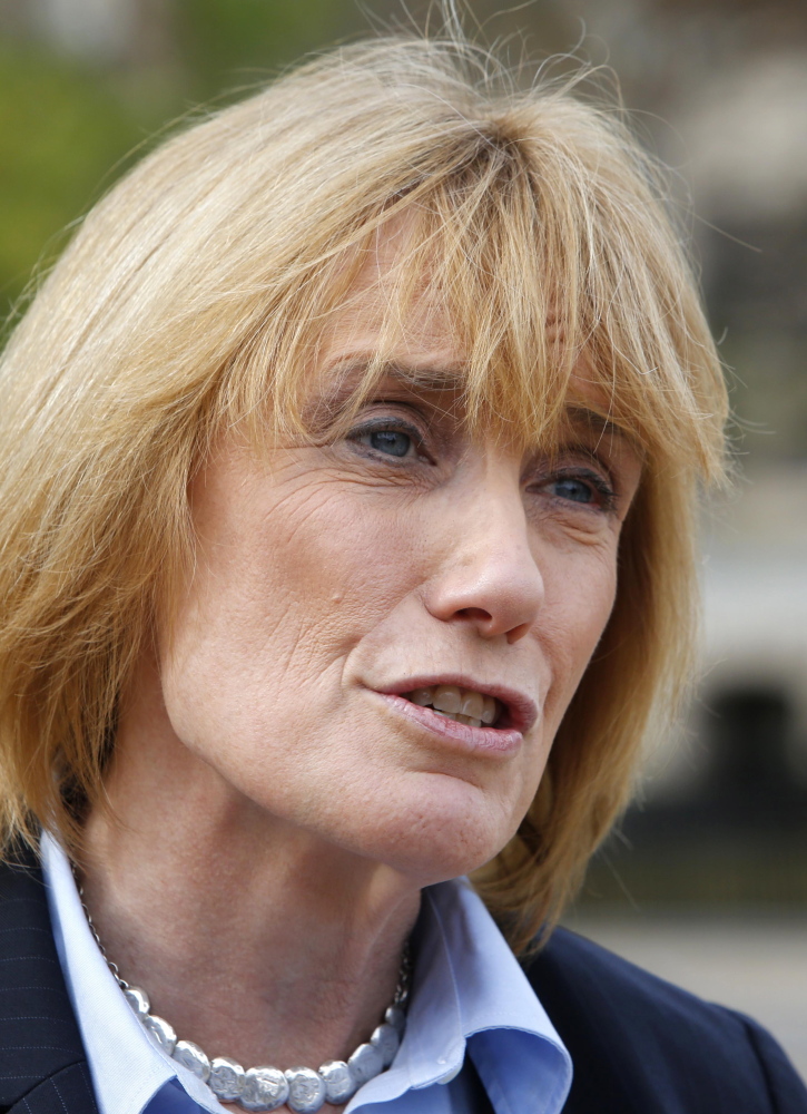 New Hampshire Gov. Maggie Hassan talks about her plans for the next legislative session during a press conference in front of the Statehouse, Wednesday Nov. 5, 2014, in Concord, N.H., after winning a second two-year term in office. Republicans kept control of the New Hampshire Senate and retook the House, meaning Hassan, a Democrat, could face roadblocks in her second term. (AP Photo/Jim Cole)