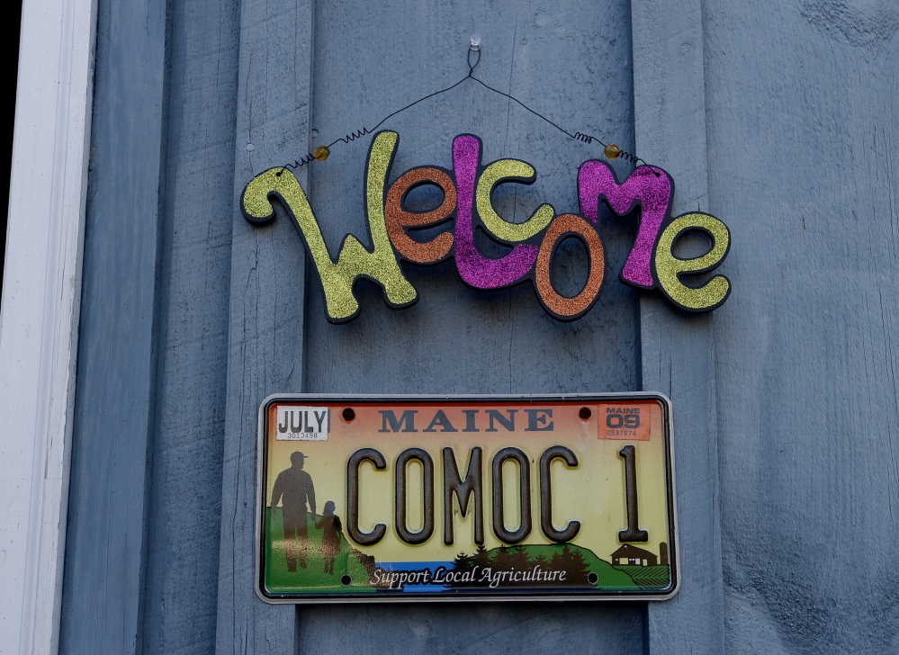 A “COMOC” license plate is the only clue to the new location of Crown O’ Maine Organic Cooperative in North Vassalboro. Leah Cook says they haven’t gotten around to putting up a sign yet.