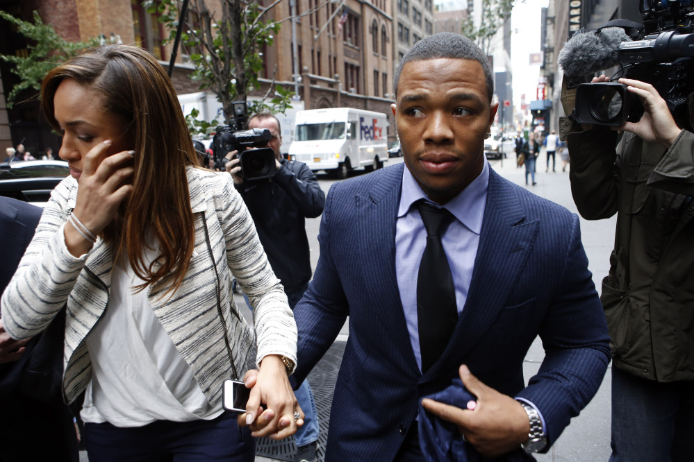 Ray Rice arrives with his wife, Janay Palmer, for an appeal hearing of his indefinite suspension from the NFL on Wednesday in New York.